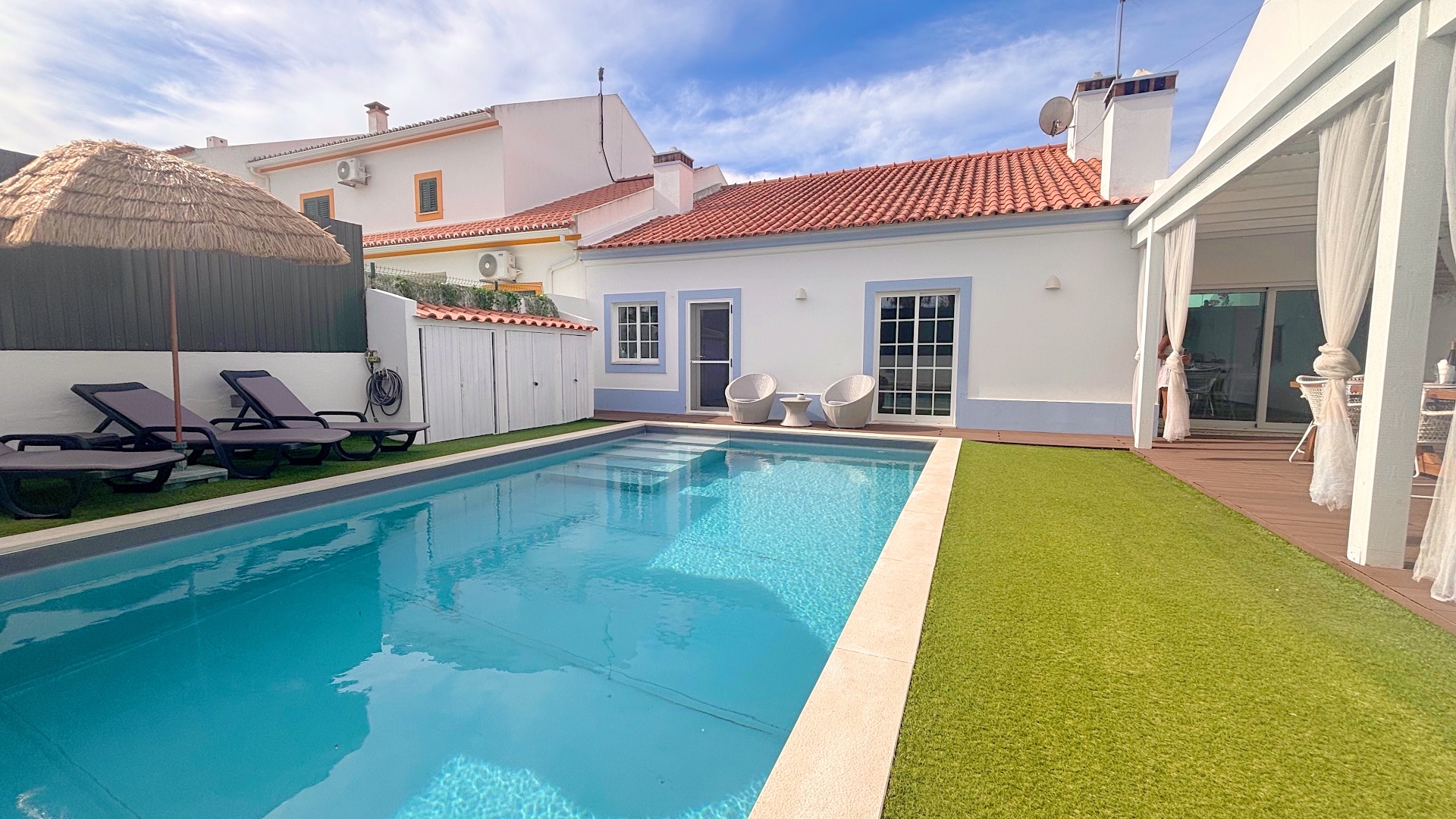 Backyard pool and lawn deck