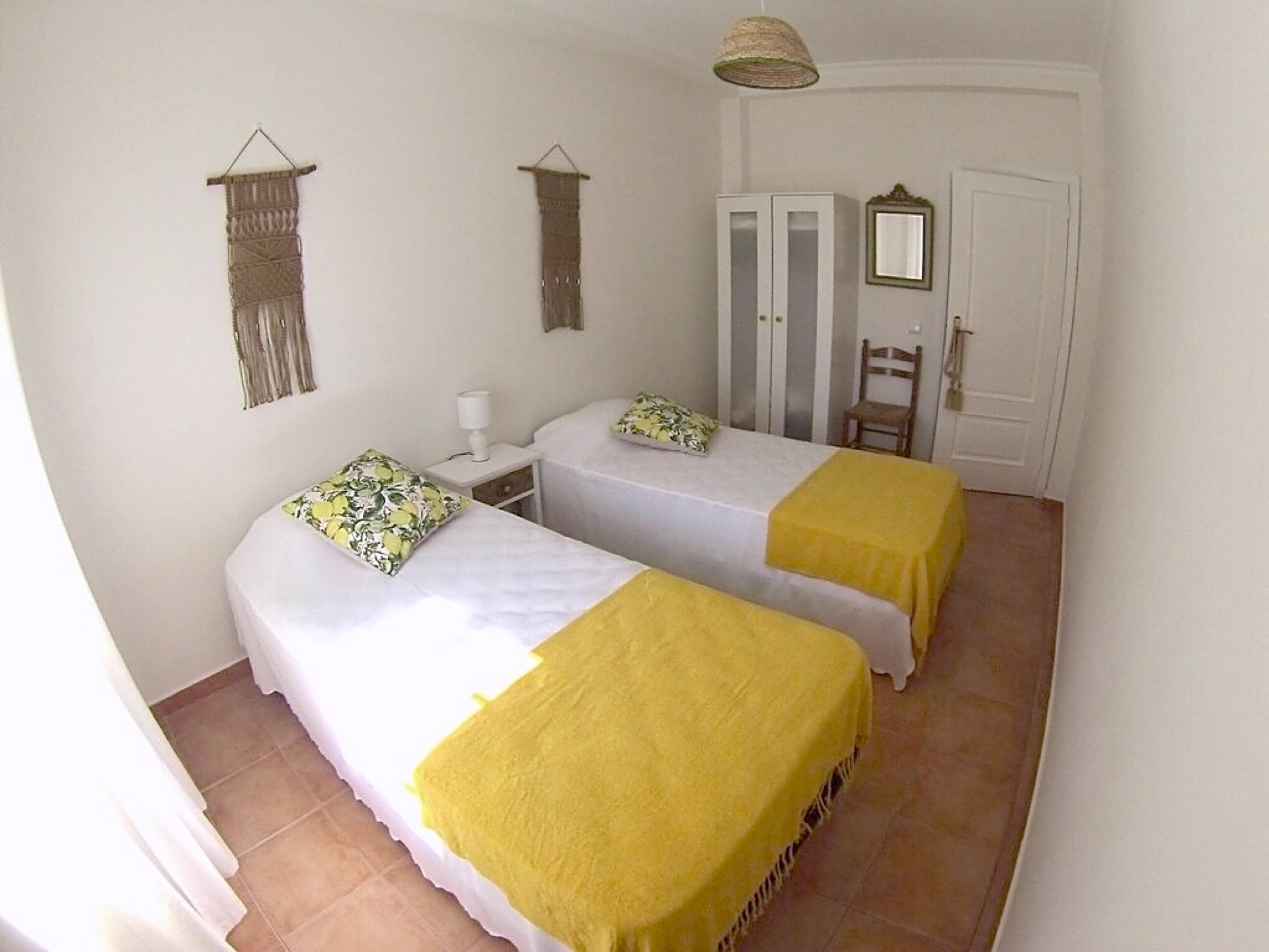 The Lemon Room twin bedroom with two single beds